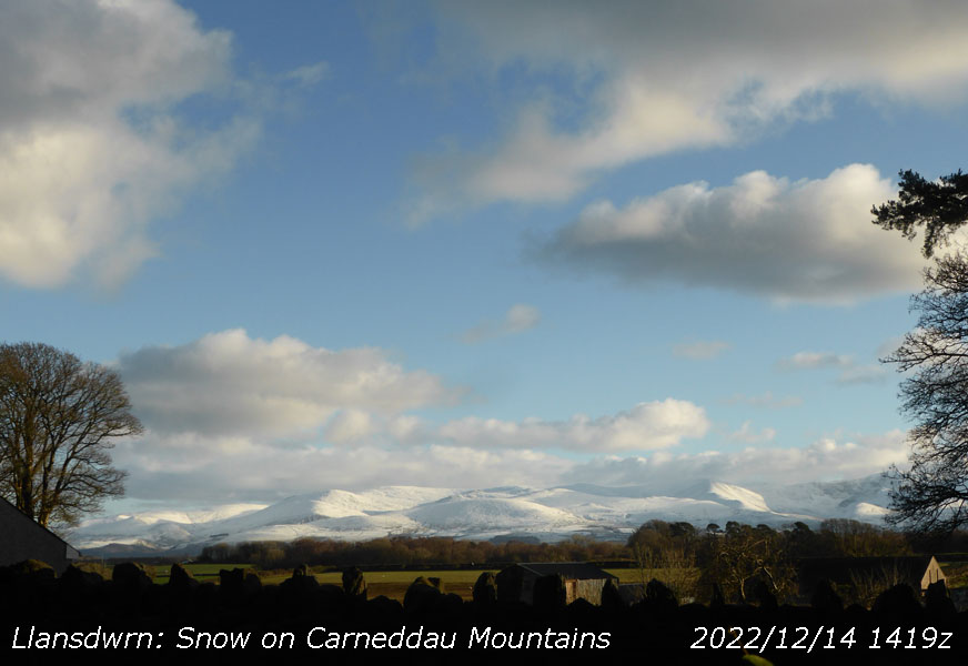 View of snow on the Carneddau Mountains.
