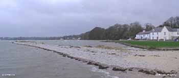 High tide in Traeth Goch - Red Wharf Bay on 14 Dec 2004. Click for larger. 