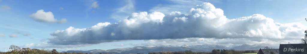 Snowdonia Mountains under line of orographic cloud.