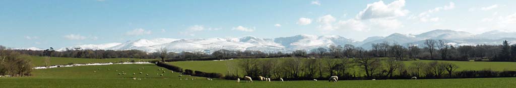 Snowclad Snowdonia Mountains.