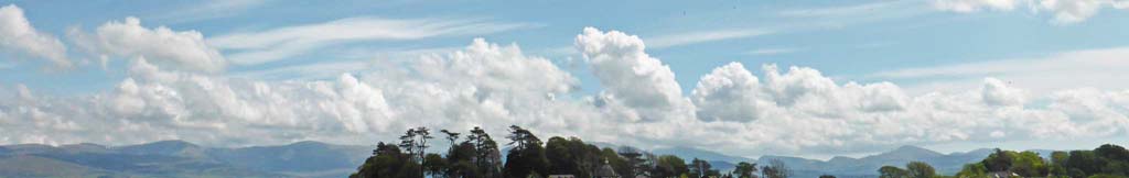 Convective clouds developed over Snowdonia seen from Llansadawrn.