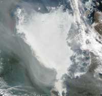 Smoke from fires burning in Yukon passing over the ice-covered Hudson Bay on 7 July 2004: NASA Aqua image courtesy Jacques Descloitres of the Rapid Response Team at NASA-GSFC.